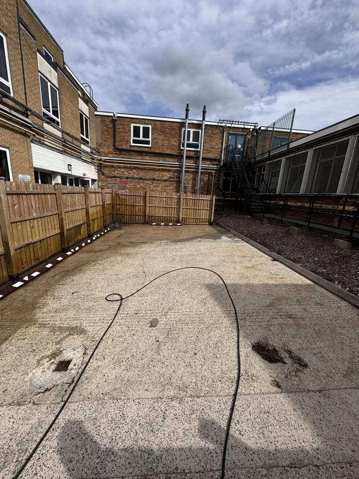 Cleared courtyard during the final wash-down