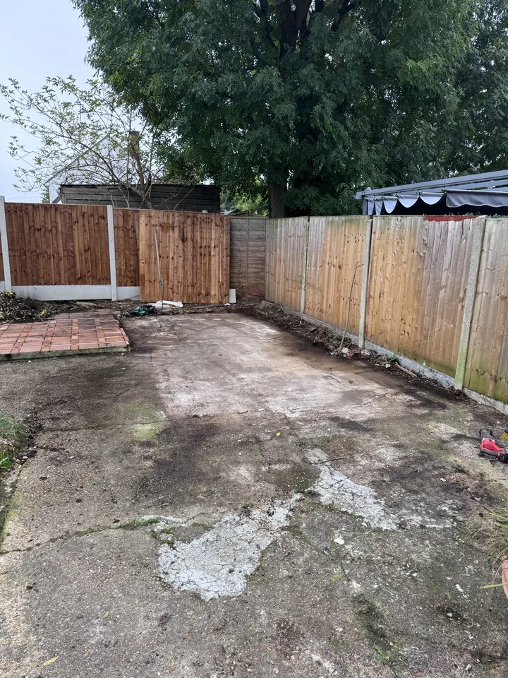 Cleared concrete base after the garage was removed
