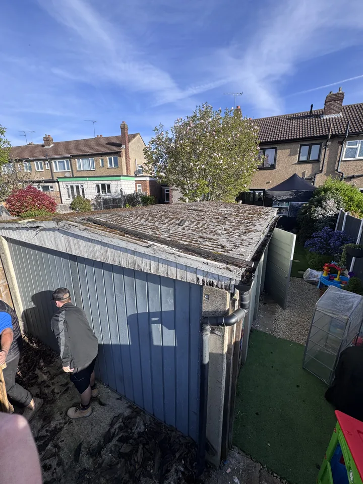 Corrugated-roof garage before dismantling