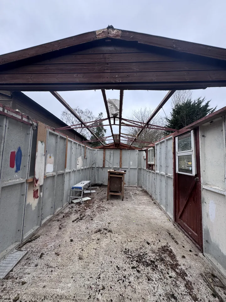 Garage interior after roof sheets were removed