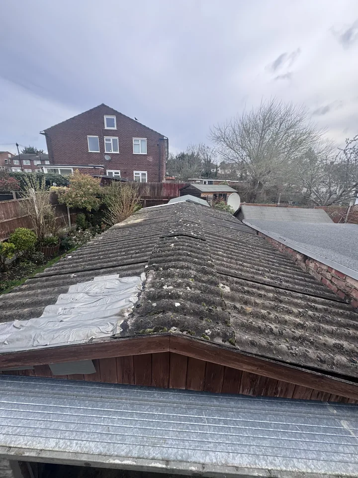 Old corrugated garage roof before removal