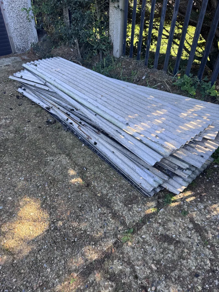 Corrugated roof sheets stacked before collection