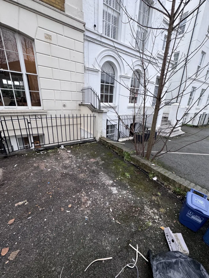 Cleared front area after rubbish collection