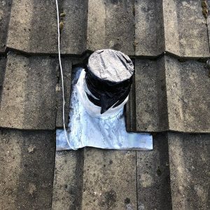 Asbestos Flue Removal on roof