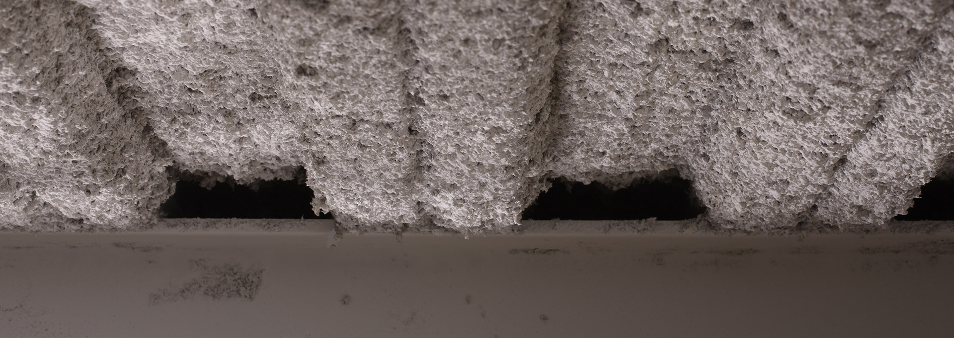 Under Roof Asbestos Sprayed Coating